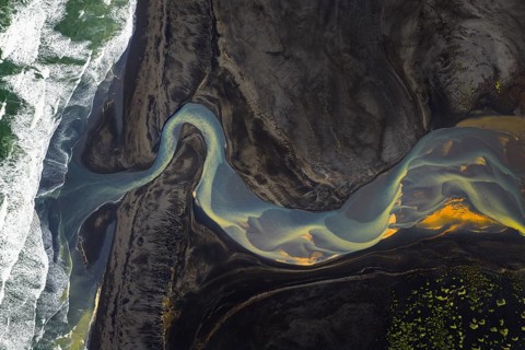 Interwoven river with colourful sediments, South Iceland, Iceland