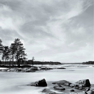 Lake Stora Gla in winter, frozen, with rocks and islands, black and white, analogue, Värmland,
