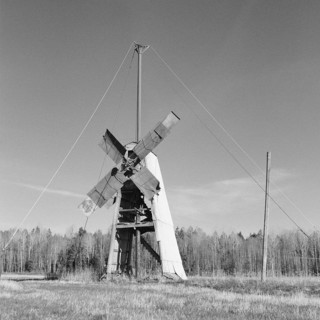 Old broken windmill in a field, black and white, analogue, Tysslingen, Örebro, Sweden