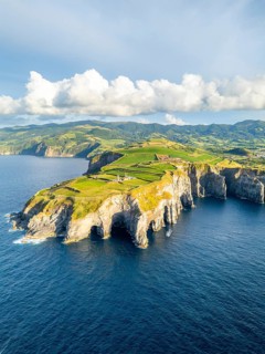 Cape Cintrao, Cliffs, Green Lush Hills, Fields, Pasturelands and Atlantic Ocean. Azores, Sao Miguel