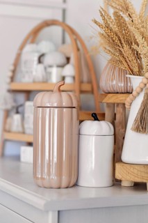 Boho autumn home decor with ceramic pumpkin jars