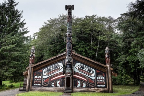 Totem poles at a Tlingit Clan House, Totem Bight State Historical Park, Ketchikan, Alaska, USA