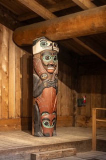 Totem poles in a Tlingit Clan House, Totem Bight State Historical Park, Ketchikan, Alaska, USA