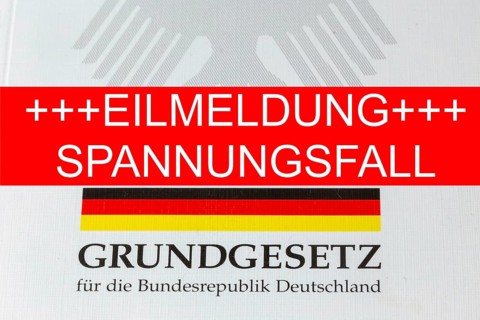 Tension case Symbolic image: The lettering EILMELDUNG SPANNUNGSFALL, with the German Basic Law