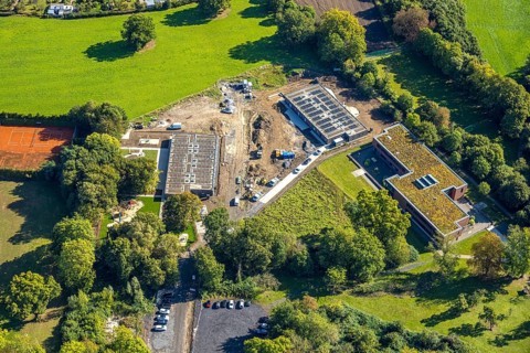 Aerial view, construction site with new day care centre of SVE Heessen, Schlossstraße, district