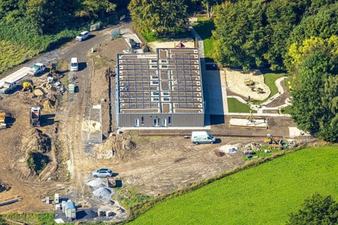 Aerial view, construction site with new day care centre of SVE Heessen, Schlossstraße, district