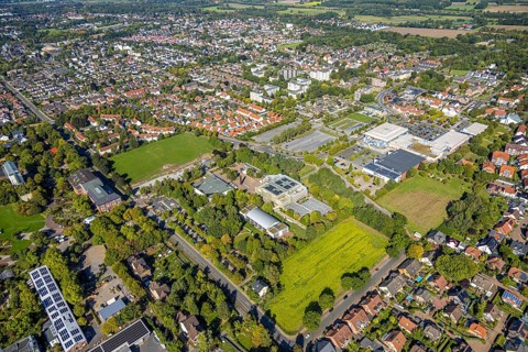 Aerial view, construction site and meadow at Freiherr-vom-Stein-Gymnasium, entrance area