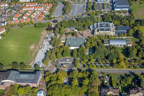 Aerial view, construction site and meadow at Freiherr-vom-Stein-Gymnasium, entrance area