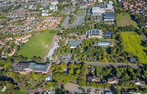 Aerial view, construction site and meadow at Freiherr-vom-Stein-Gymnasium, entrance area