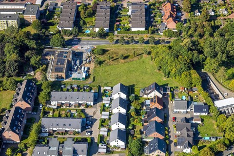 Aerial view, construction site with new building day care centre Villa Kunterbunt at