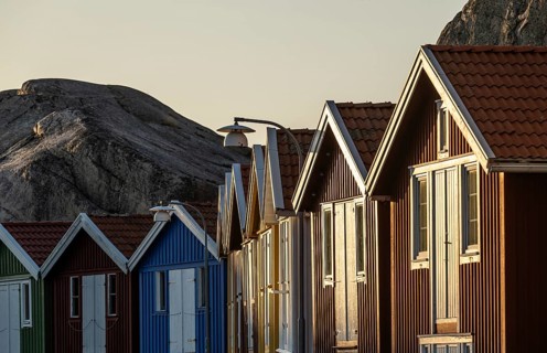 Boathouses between rocks in the harbour of Smögen, Smögenbryggan, Västra Götalands Län, Bohuslän,