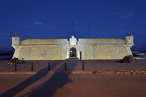 Forte da Ponta da Bandeira fortress by night, Lagos, Algarve, Portugal