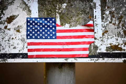 Torn sticker from US flag