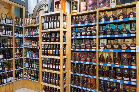 Shelves with various bottles of spirits in a shop, Gntunik supermarket, Aragazotn province, Armenia