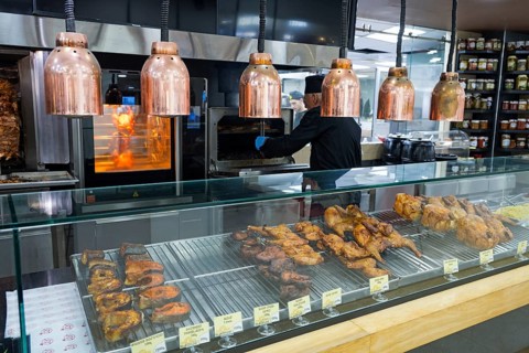 Various meats are prepared on the grill under copper lamps, Gntunik supermarket, Aragazotn