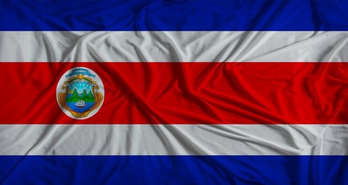 Costa Rican flag with fabric texture background. National flag of Costa Rica