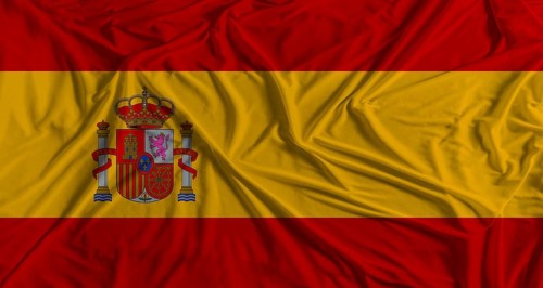Spanish flag with fabric texture background. National flag of Spain