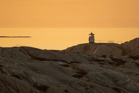 Small lighthouse at sunset, archipelago, Smögen, Smögenbryggan, Västra Götalands Län, Bohuslän,