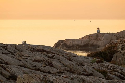 Small lighthouse at sunset, archipelago, Smögen, Smögenbryggan, Västra Götalands Län, Bohuslän,