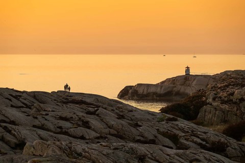 Small lighthouse at sunset, archipelago, Smögen, Smögenbryggan, Västra Götalands Län, Bohuslän,