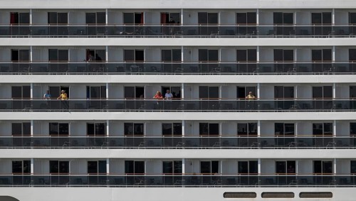 Detailed view of balconies of a cruise ship with passengers, Warnemünde, Rostock,