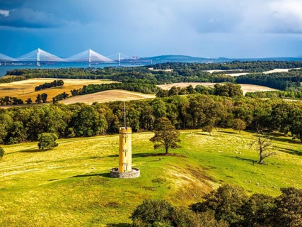 Binns Tower over Scotish farms and Forth Estuary from drone, House of the Binns, Linlithgow,