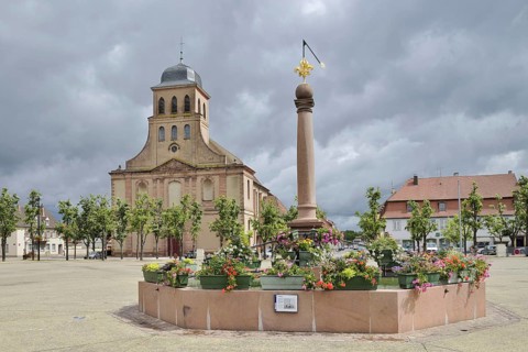 Church of St Louis and fountain on Place d'Armes-General-de-Gaulle, Neuf-Brisach, Haut-Rhin