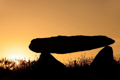 Dolmen at sunset, Finistere department, Brittany, France