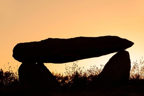 Dolmen at sunset, Finistere department, Brittany, France