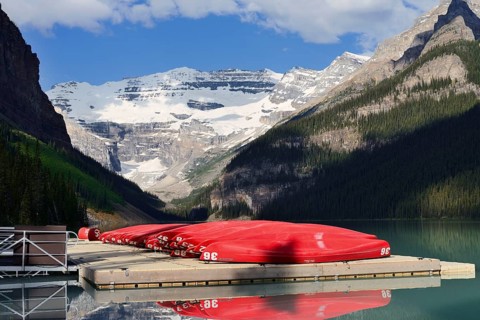 Red canoes at Lake Louise, Banff National Park, Alberta, Canada