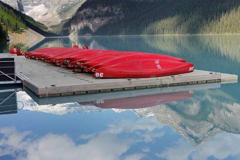Red canoes at Lake Louise, Banff National Park, Alberta, Canada
