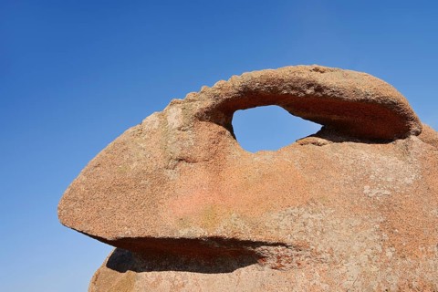 Granite rocks on the Cote de Granit Rose coast near Ploumanac'h, Cotes-d'Armor, Brittany, France