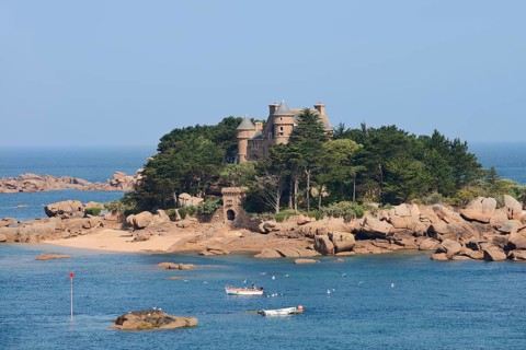 Rocky coast and Costaeres Castle, Ploumanac'h, Cote de Granit Rose, Cotes-d'Armor, Brittany, France