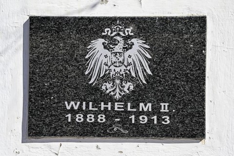 Memorial plaque on the monument to Kaiser Wilhelm II at the railway station in Aus, Karas Region,