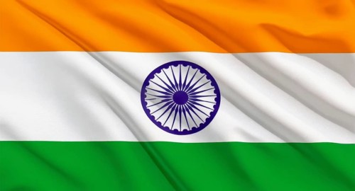 The national flag of India, a tricolor with saffron, white, and green stripes, and the Ashoka