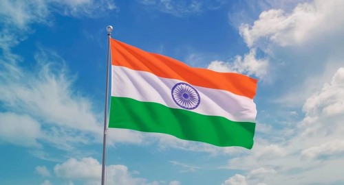 The Indian flag, a symbol of the country's identity, flutters in the wind with a vibrant display of