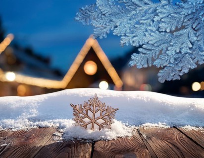 Vintage wooden table in front of a blurry winter holiday background, AI generated