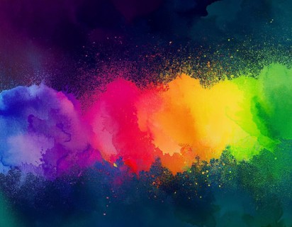 Colorful abstract art depicting a vibrant explosion of rainbow hues on a dark background, evoking
