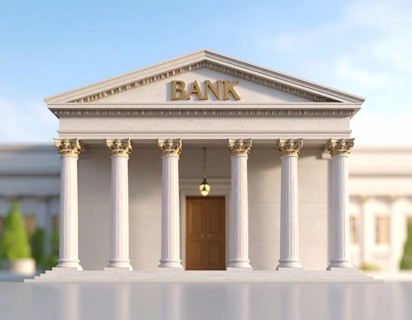 Bank building facade with classical columns, symbolizing finance, economic stability, investment