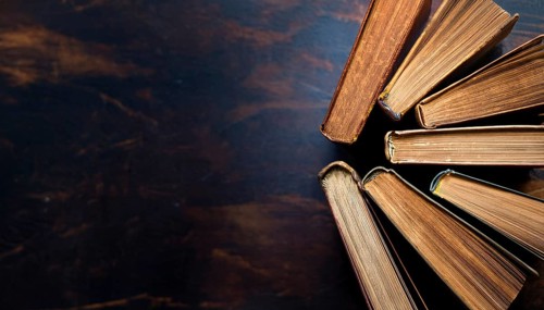 Old books arranged highlighting their historical significance. Neatly arranged representing a