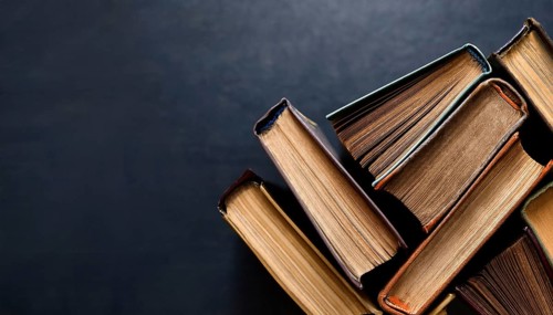 Old books arranged highlighting their historical significance. Neatly arranged representing a