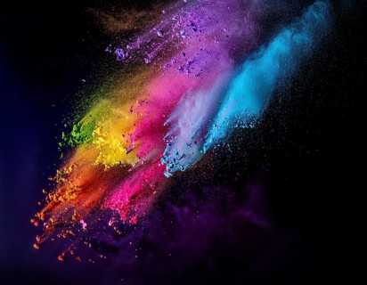 A colorful explosion powder on black background.. Multicolored powder explosion, AI generated