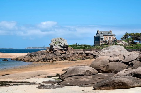 View from the harbour beach of Trégastel on the Côte de Granit Rose at low tide over the iconic