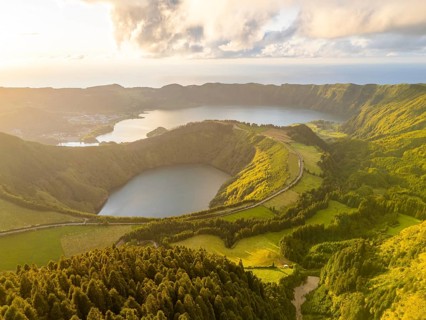 Sete Cidades Caldera on Sunny Evening. Blue Lake and Santiago Lake. Forest and Hills with