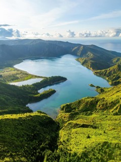 Lagoa do Fogo Crater Lake at Sunrise. Green Lush Hills and Mountains. Azores, Sao Miguel Island.