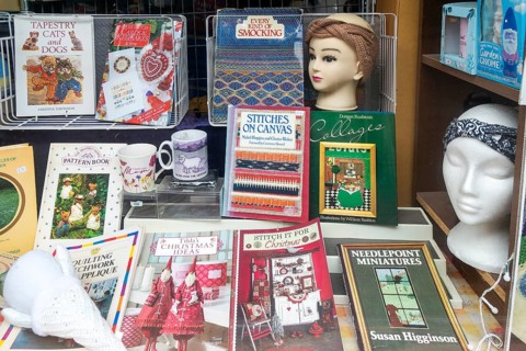 Shop window display books materials for stitching and smocking, Make Do And Mend shop, The Brittox,