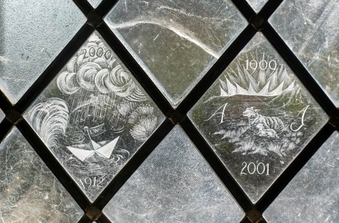 Glass engraved memorial panes, St Mary's church, Alton Barnes, Wiltshire, England, UK designed by
