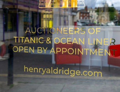 Sign on glass entrance door Henry Aldridge auctioneers of Titanic and Ocean Liner memorabilia,