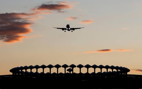 Landing of an aircraft at BER Berlin Brandenburg Willy Brandt Airport, Wullenweber antenna for