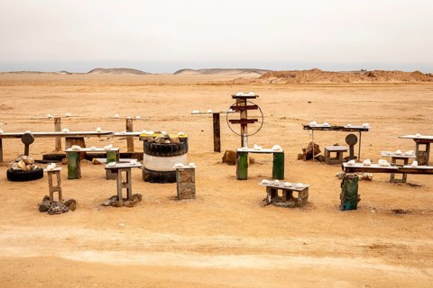 Pink salt displayed on wooden stands along the road to Namib-Naukluft National Park and Sandwich
